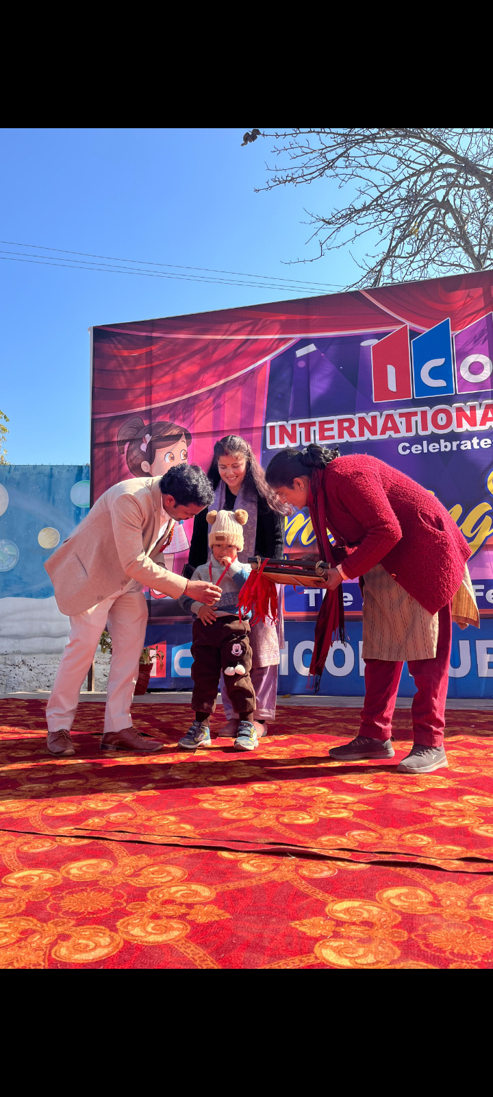 While presenting medal to a child at ICON international school Pithoragarh