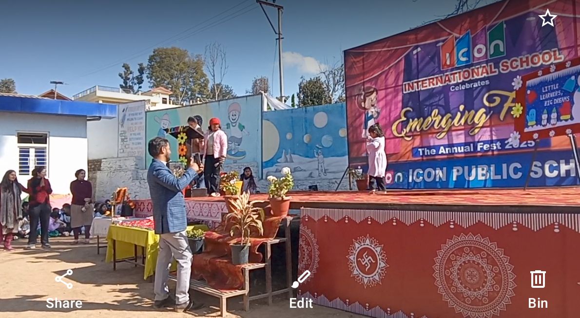 Principal of Icon international school encouraging a child for confident performance